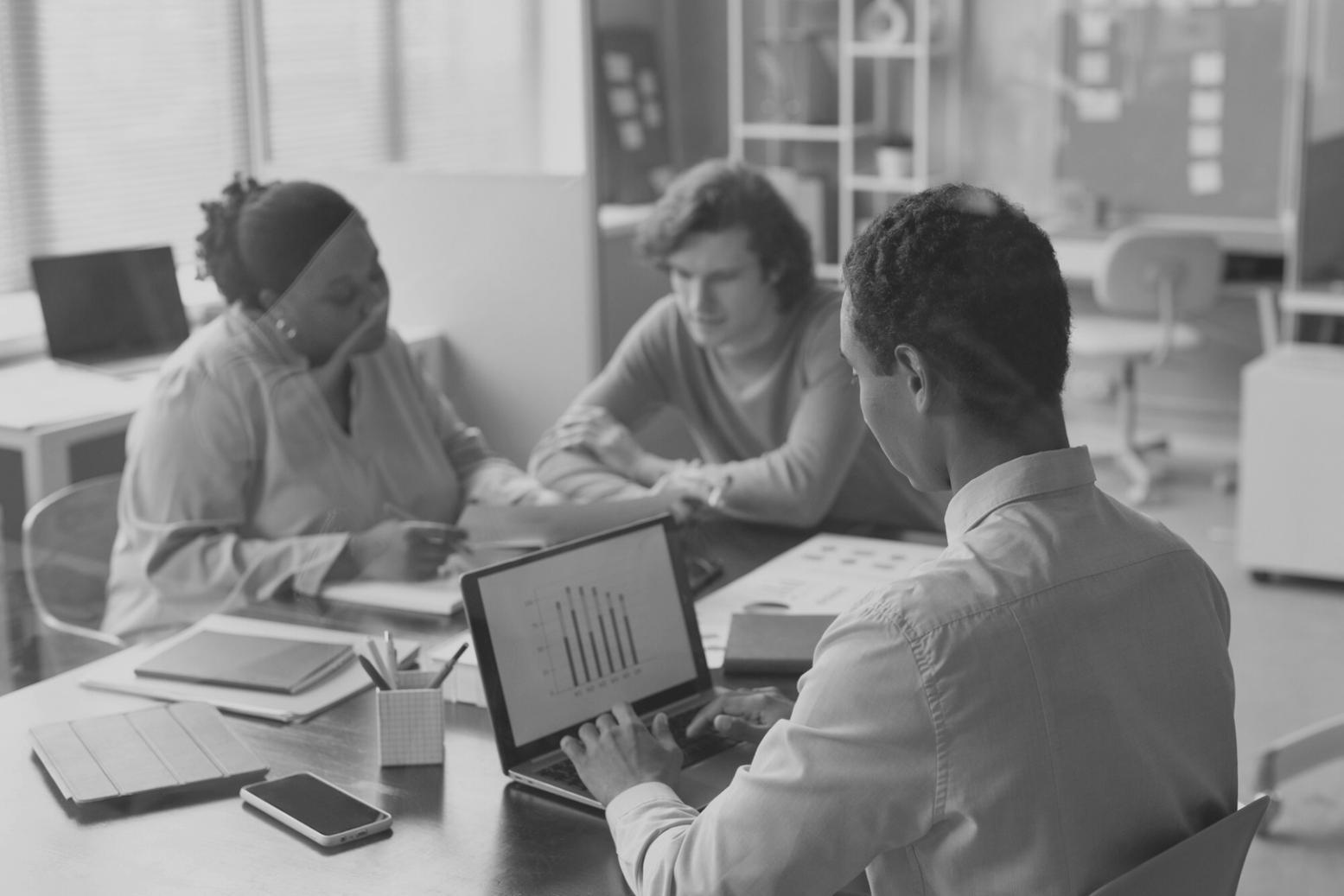 Professional financial analysis workspace showing capital budgeting calculations and investment planning documents