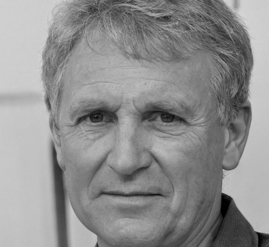 Professional portrait of Dexter Ashworth, corporate finance expert